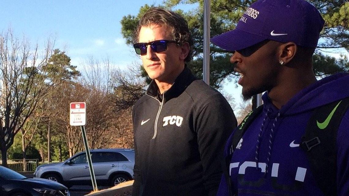 TCU co-offensive coordinator Doug Meacham and running back Kyle Hicks leave a press conference Tuesday in Memphis, where the team is preparing for the Liberty Bowl against Georgia.