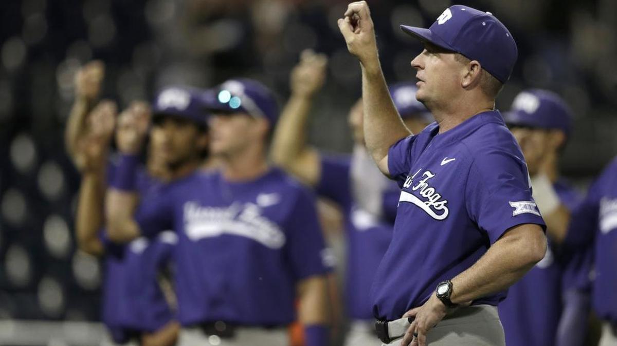 TCU coach Jim Schlossnagle joins the singing of the alma mater following a 9-2 victory against Florida on Friday night at the College World Series.