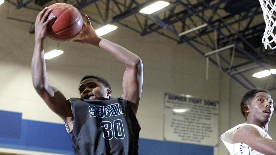 Josh Parrish, left, averaged 12 points and seven rebounds as a junior last season at Arlington Seguin High School.