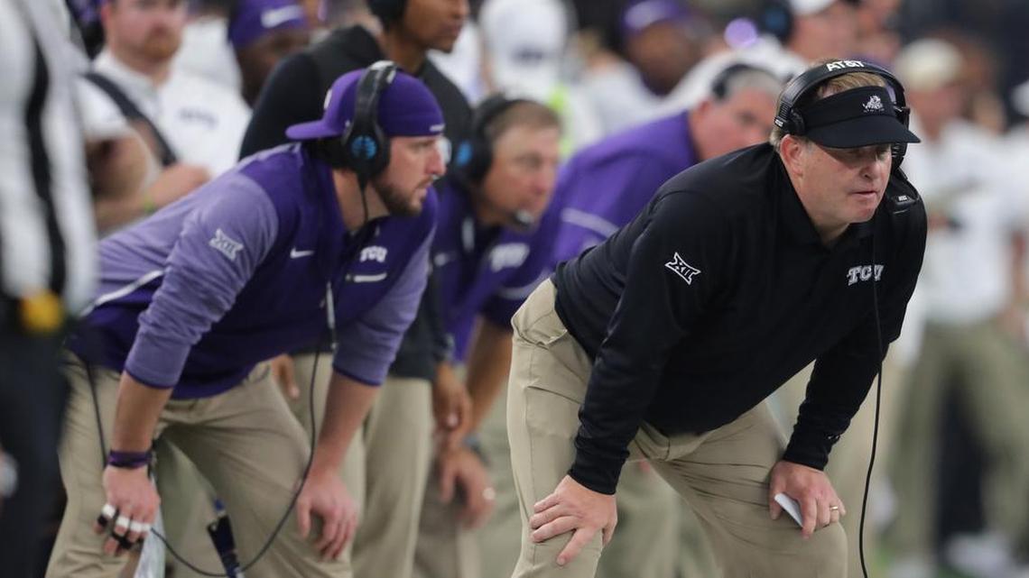 TCU coach Gary Patterson watches from the sideline, with assistant coaches including Jason Phillips nearby, during action in the Big 12 championship game against Oklahoma at AT&T Stadium on Dec. 2.