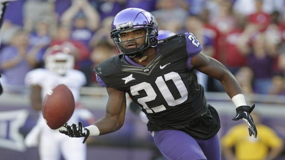 
TCU receiver Deante’ Gray flips the ball to the official after a third-quarter touchdown against Oklahoma last season. The senior from Houston had eight touchdown catches, second most on the team.
