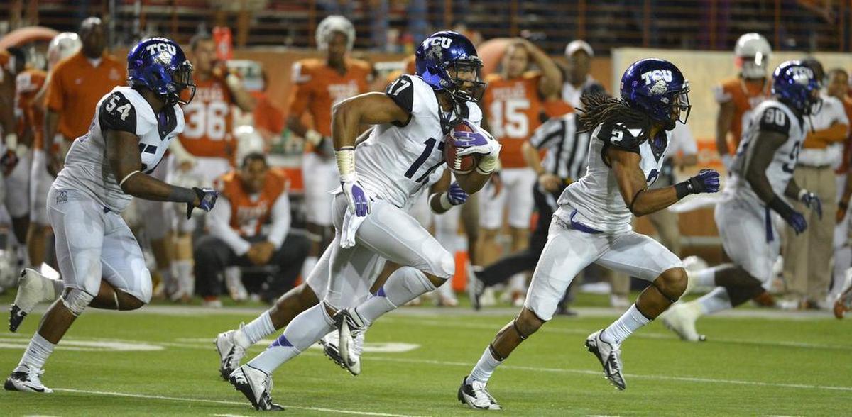 TCU safety Sam Carter intercepts the final Texas Longhorns pass to seel the Horned Frogs’ 20-13 win against Texas in Austin on Thanksgiving night, Nov. 22, 2012.