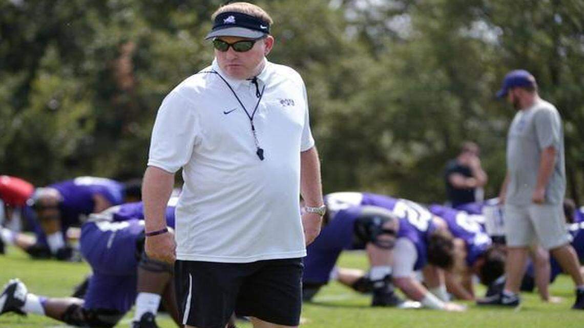 
TCU coach Gary Patterson looks on during stretching in an August 2014 practice. He said Tuesday after a spring practice that he’s “not that happy” with the way drills are going for the 2015 team.

