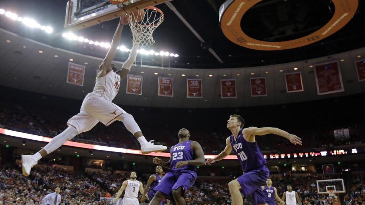 Prince Ibeh scored a career-high 17 points to help Texas flush Devonta Abron, center, Vladimir Brodziansky and TCU on Tuesday night.