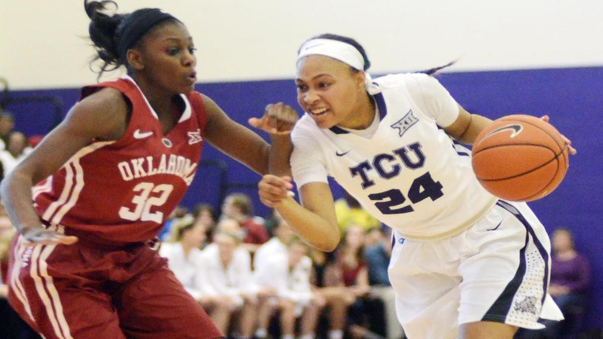 TCU’s Natalie Ventress, right, drives against Oklahoma’s Lanesia Williams during OU’s 97-81 victory Wednesday. The Sooners went on a 18-1 fourth-quarter run.