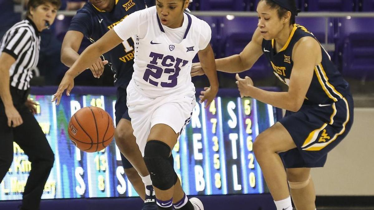 AJ Alix, breaking away from West Virginia’s Anja Martin, and her TCU teammates will face a tough Oklahoma State defense on Wednesday night.