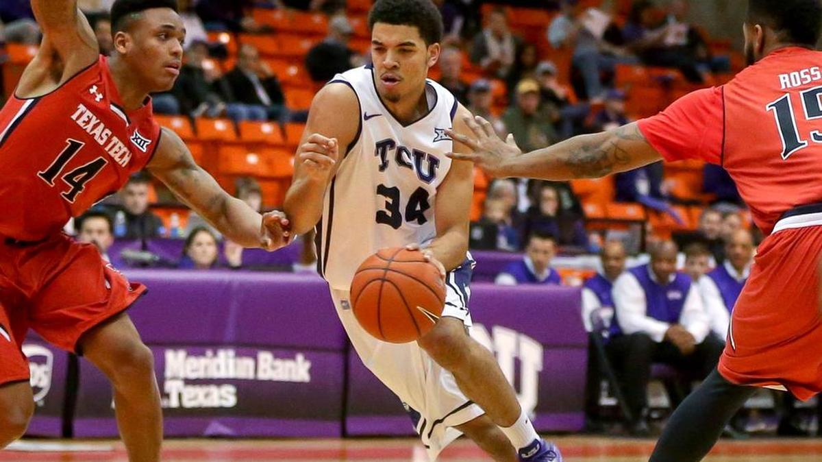 TCU guard Kenrich Williams, shown here against Texas Tech, will miss tonight’s season opener and is sidelined indefinitely because of a lower leg injury. Williams missed last season because of a knee injury.