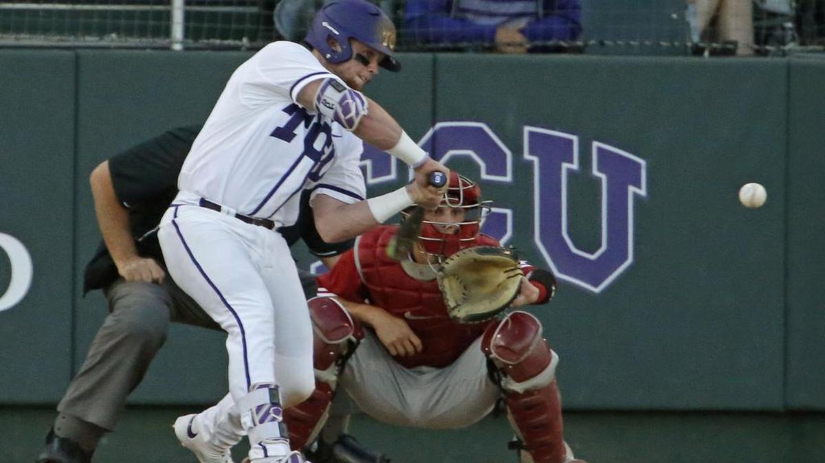 TCU catcher Evan Skoug swings and connects for a two-run home run in the first inning against Oklahoma on Friday night. It was part of a five-RBI game that helped earn him the Big 12 Player of the Week award.
