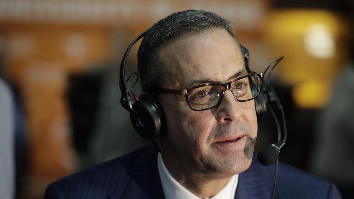 Chris Del Conte gives a radio interview Monday following a news conference where he was introduced at the new vice president and athletics director for the University of Texas.