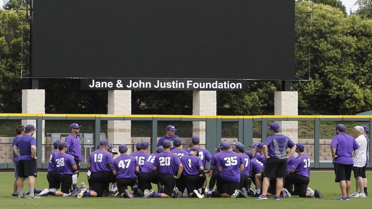The TCU baseball team gathers around coach Jim Schlossnagle before practice at Lupton Stadium on June 14, ahead of their trip to the College World Series.