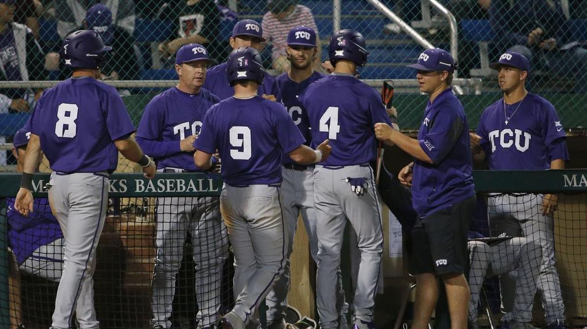 TCU baserunners Austen Wade (8), Evan Skoug (9) and Cam Warner get congratulations in the dugout after scoring on an error in right field in a game at UT Arlington on March 29.