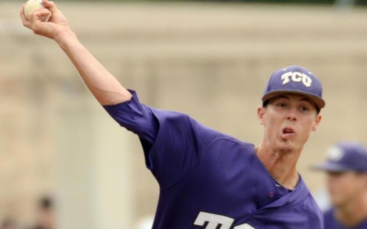 
TCU reliever Trey Teakell makes a pickoff throw to first base against Kansas in the eighth inning of a May 9 game in Fort Worth. He pitched two innings in what became a 10-inning victory. It was the last action of the regular season for the senior from Weatherford.
