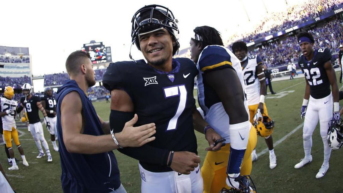 TCU quarterback Kenny Hill greets fans and friends following a 31-24 victory against West Virginia on Saturday at Amon G. Carter Stadium. The senior from Southlake threw, ran for and caught a touchdown, earning recognition from the Paul Hornung Award.
