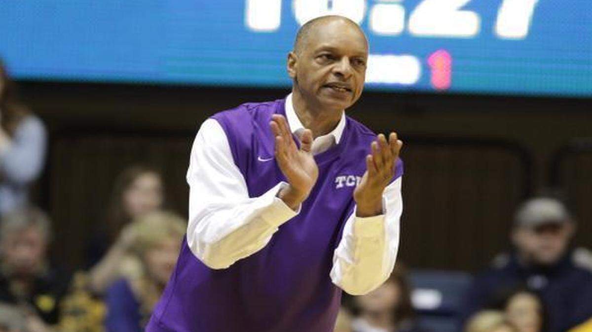 
TCU coach Trent Johnson encourages his players during the first half against West Virginia. The Mountaineers defeated TCU 86-85 in overtime. 
