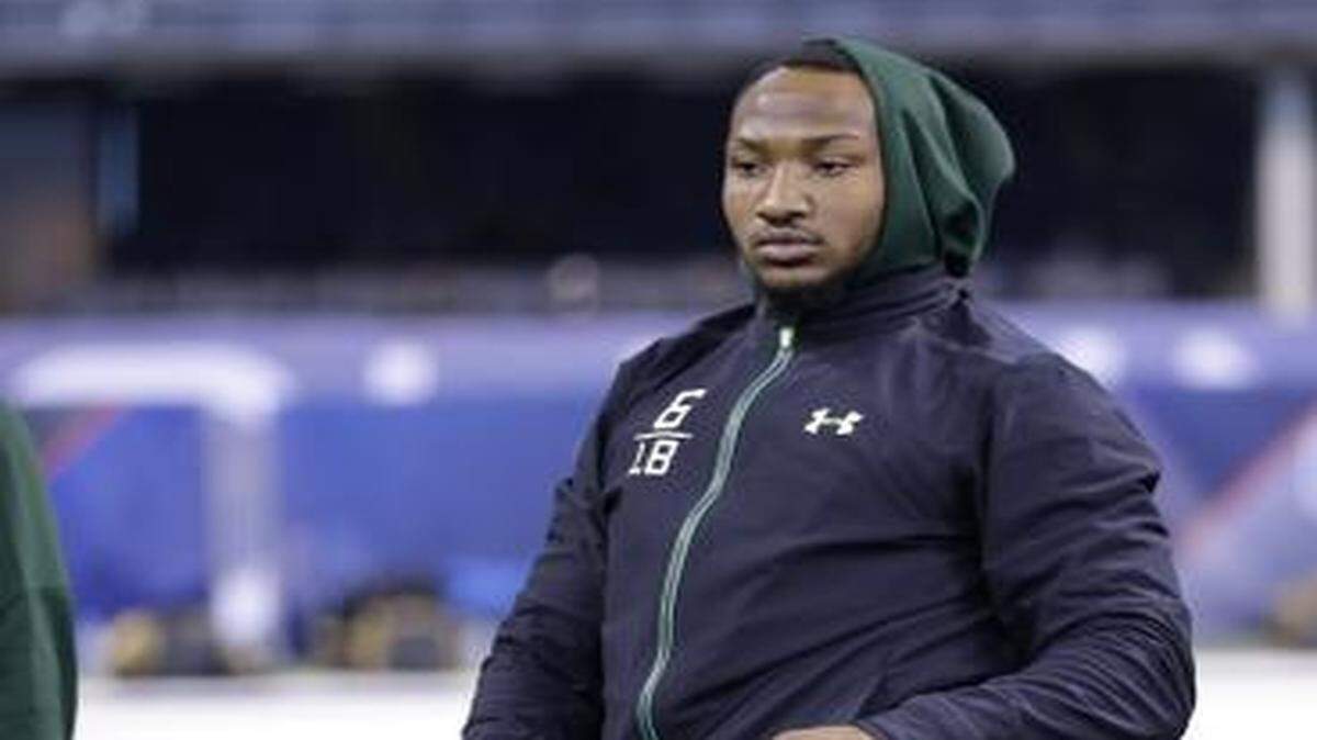 
TCU linebacker Paul Dawson stretches before drills at the NFL scouting combine in Indianapolis. He said he had to answer questions from NFL personnel about being a distraction at TCU.
