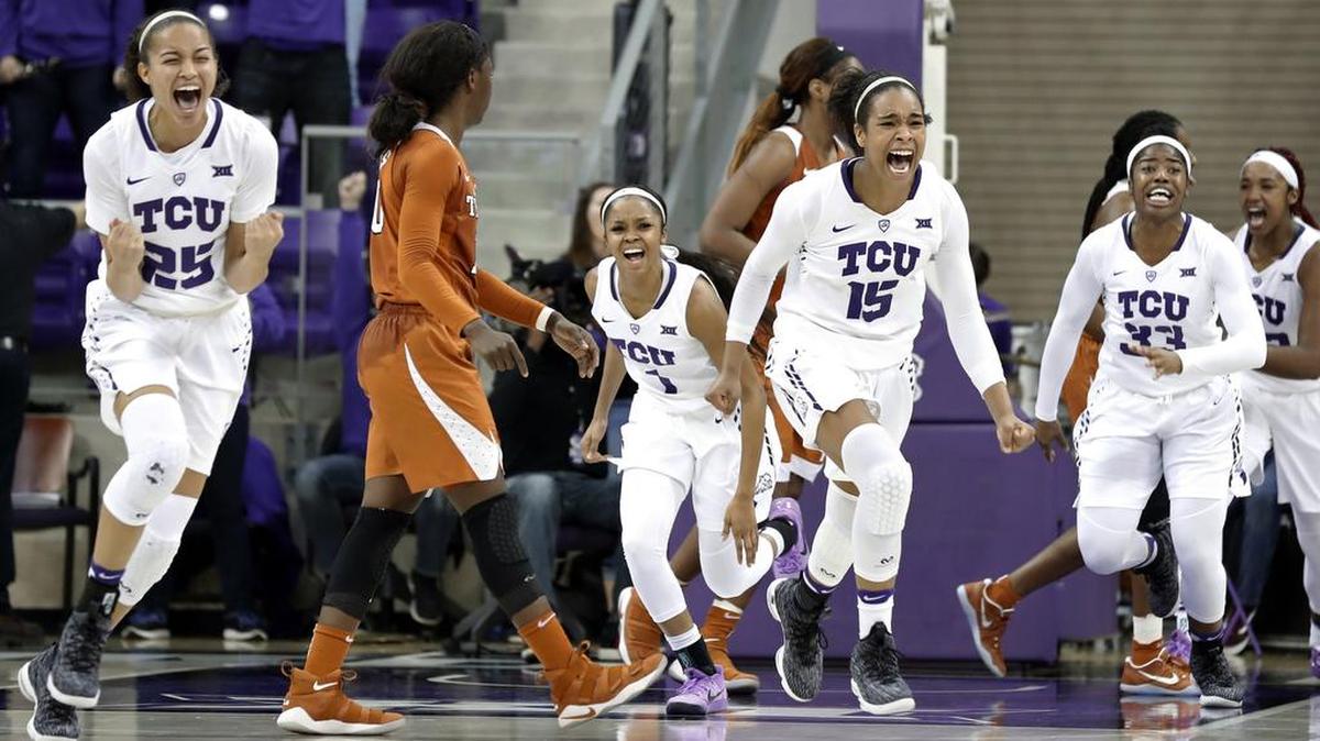 TCU’s Kianna Ray (25), Toree Thompson (1), Jayde Woods (15) and Adeola Akomolafe (33) celebrate the team’s 79-77 win over Texas in Wednesday’s women’s basketball game in Fort Worth.