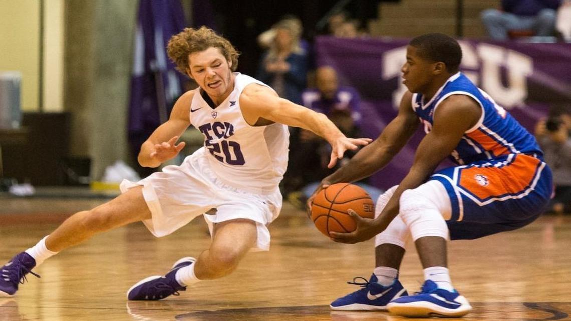 Dalton Dry of TCU dives for a loose ball during the Frogs’ victory over Houston Baptist. Coach Trent Johnson noted TCU’s improvement in that part of their game Thursday.