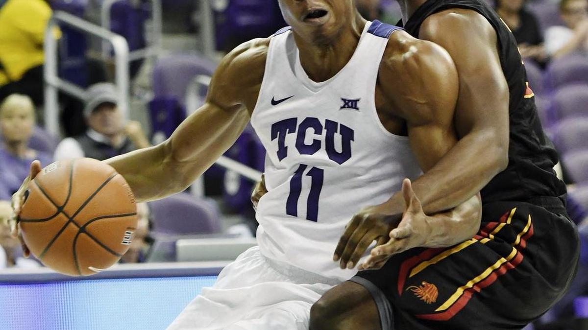 TCU guard Brandon Parrish dribbles against a St. Thomas defender in a game earlier this season.