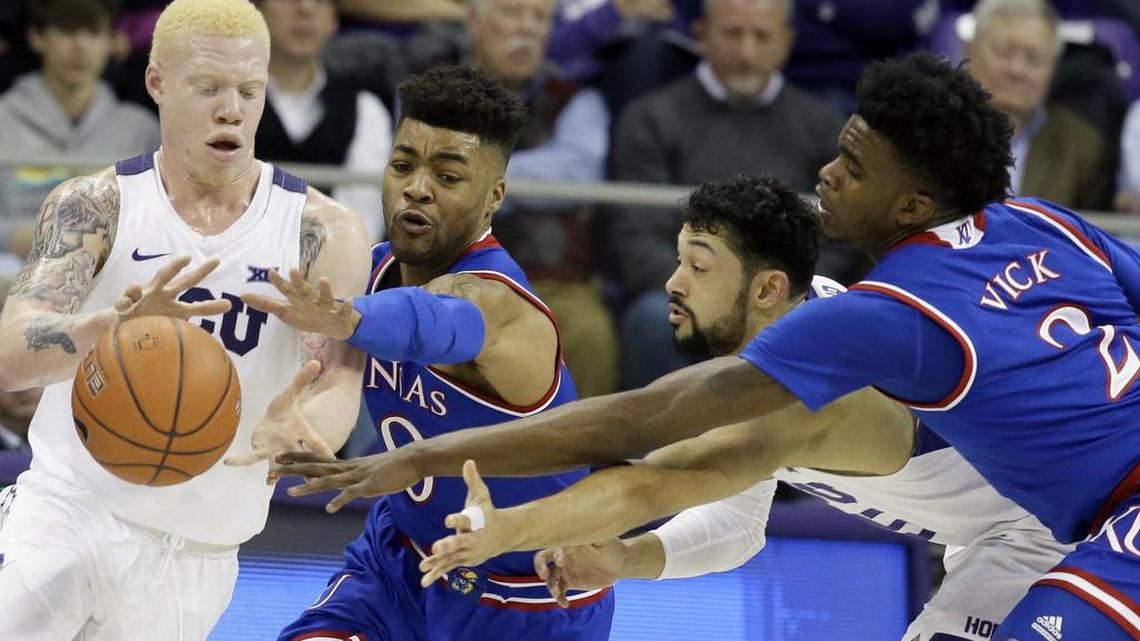 TCU is enjoying a turnaround season by leaning on newcomers Jaylen Fisher, left, and Alex Robinson, who often face experienced players like Kansas’ Frank Mason III, second from left.