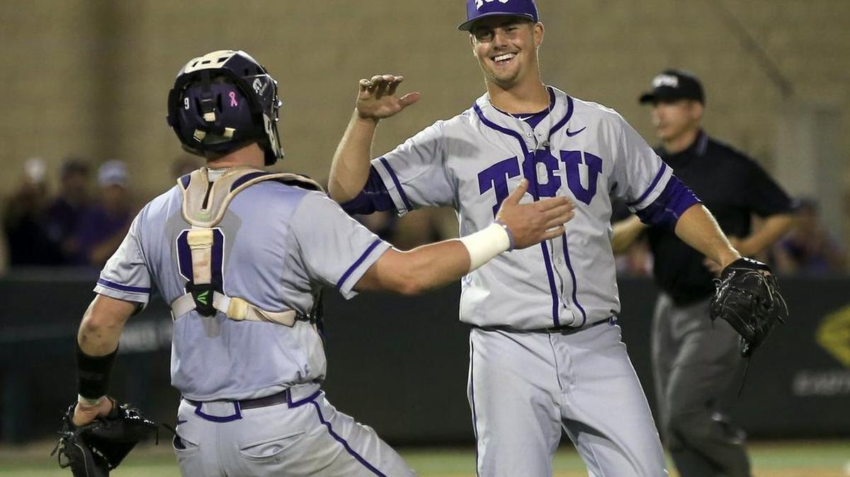 TCU pitcher Brian Trieglaff celebrates the final out with catcher Evan Skoug after an 8-1 victory against Arizona State on Sunday at the Fort Worth Regional. The Horned Frogs swept the regional and won their sixth in eight seasons.