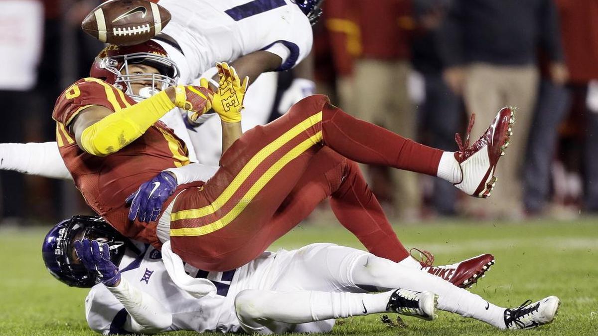 Iowa State’s Allen Lazard loses the grip on a pass as TCU cornerback Corry O’Meally makes the breakup on Oct. 17. O’Meally leads the Horned Frogs with seven pass breakups.