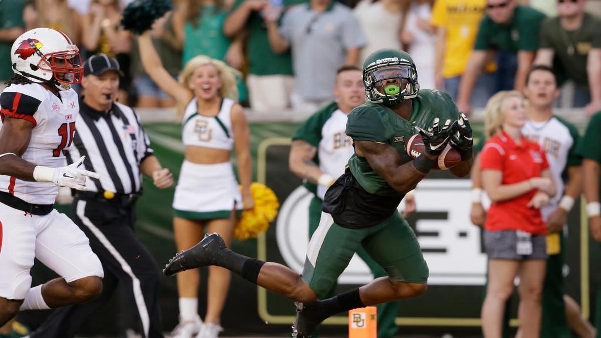 Baylor wide receiver Corey Coleman catches a touchdown pass against Lamar during the Bears’ 66-31 victory in September. Under the Big 12’s new rule, conference members will have to schedule at least one Power 5 opponent.