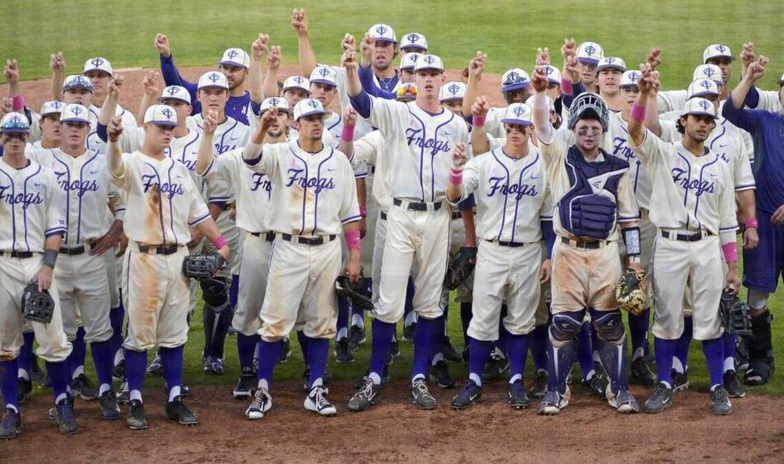 
The TCU baseball team salutes during the singing of the school song following a sweep of Texas in April at Lupton Stadium. The sweep started a run of nine consecutive victories in the Big 12 for the Horned Frogs, who clinched the conference championship with a 5-4 win at Oklahoma on Thursday night.
