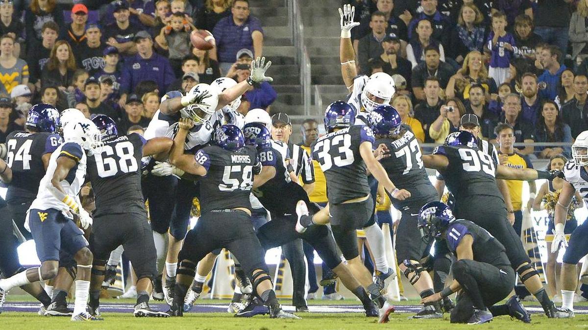 TCU kicker Jaden Oberkrom follows through on a first-quarter field goal against West Virginia in a 2015 game. Oberkrom, who kicked four years for the Horned Frogs, made a game-winning field goal at West Virginia in 2014.