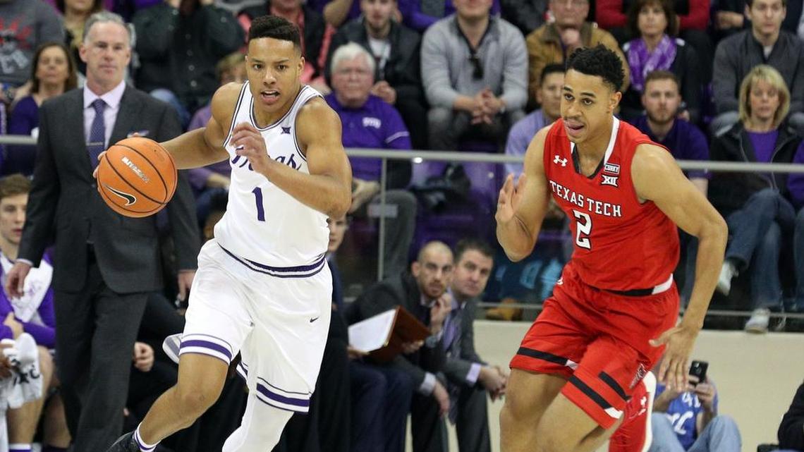 TCU guard Desmond Bane moves the ball down the court as Texas Tech guard Zhaire Smith pursues him during the Red Raiders win Saturday in Fort Worth.
