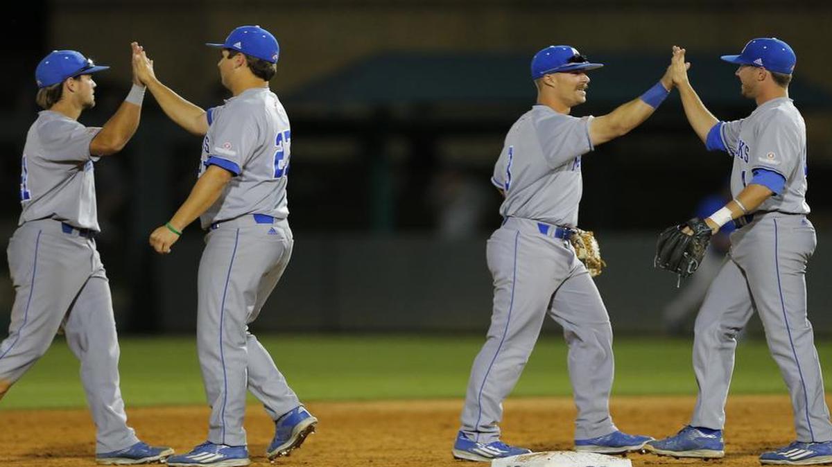 UT Arlington players celebrate a 4-3 victory against TCU at Lupton Stadium on Wednesday night.