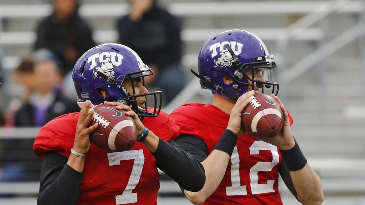 TCU quarterbacks Kenny Hill and Foster Sawyer throw in warmups Friday night to before the Spring Game. Both player completed about half their passes during the game, but neither threw for a touchdown.