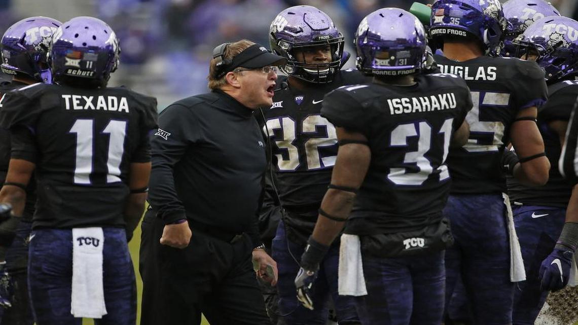 TCU coach Gary Patterson has words for the defense during a fourth-quarter timeout in a Dec. 3 game against Kansas State. The Horned Frogs gave up 336 yards rushing and lost 30-6, finishing a 6-6 regular season.