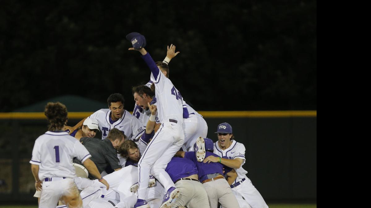 
The Horned Frogs celebrate as TCU defeats Texas A&M 5-4 in 16 innings in the NCAA Division 1 Baseball Super Regional final in Lupton Stadium on Monday.

