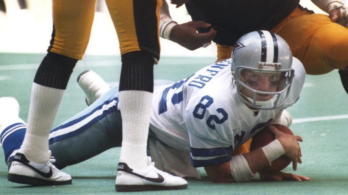 Mike Renfro played 10 years in the NFL, six with the Houston Oilers and four with the Dallas Cowboys.