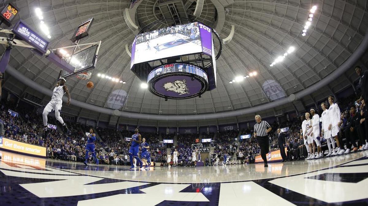 TCU forward JD Miller scores on a break away dunk against Kansas during a game on Jan. 6.