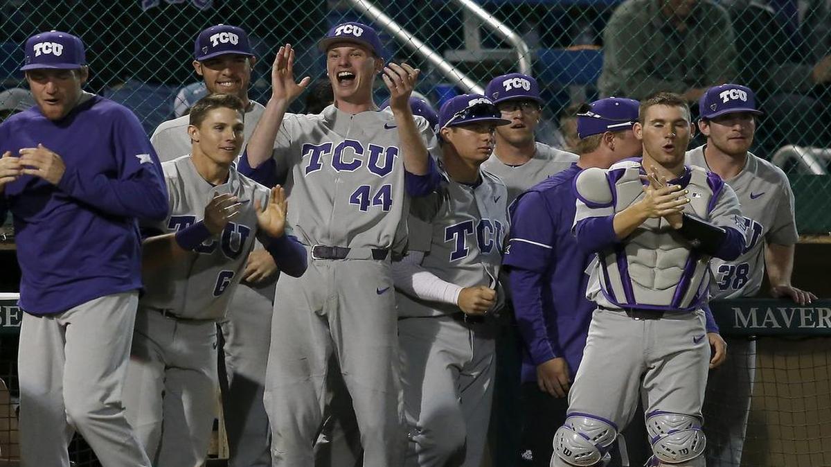 The TCU dugout celebrates after Evan Skoug’s two-run home run in eighth inning to break a 2-2 tie against UT Arlington.
