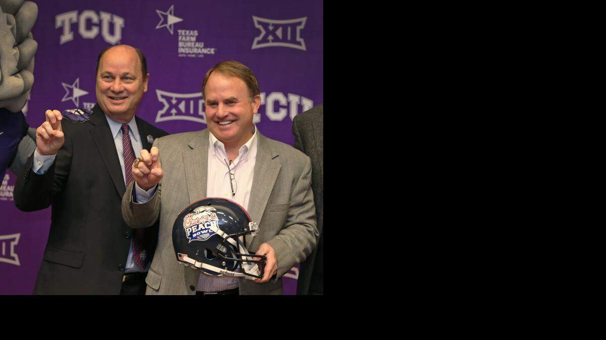 
Peach Bowl president Gary Stokan, left, complimented Gary Patterson for taking a high-road approach.
 
