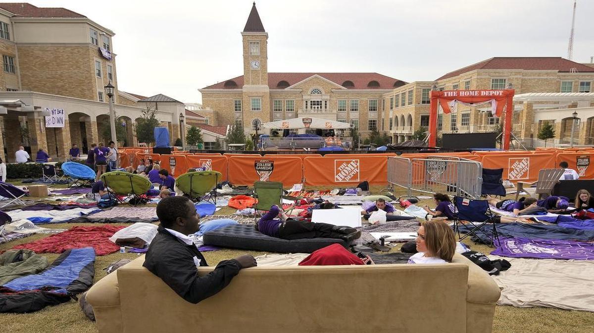 TCU students Tony Baiyeri and Emily Zimmerman sit on a sofa that Baiyeri brought to camp out overnight for a spot for ESPN’s College GameDay show in November 2009. It was the first appearance on campus for the show. The show returns to campus on Saturday for No. TCU’s game against No. 23 West Virginia at Amon G. Carter Stadium.