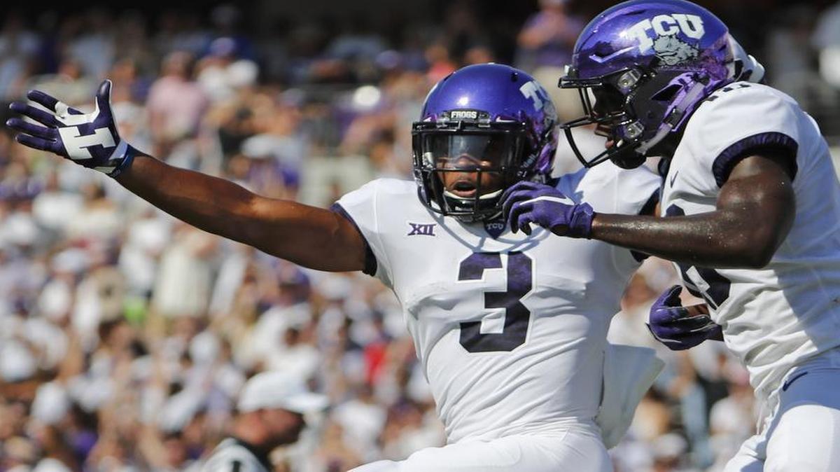 TCU receiver Shaun Nixon (3) celebrates with teammate Jalen Reagor after scoring Sept. 16 against SMU.