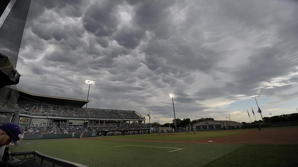 
Storm clouds hover over Lupton Stadium at TCU during the seventh inning of Sunday’s game against Texas. Rain has forced No. 5 TCU to juggle it’s schedule over the weekend when Friday’s game against Texas was rained out forcing a Saturday doubleheader, and Tuesday’s game against No. 16 Dallas Baptist was also rained out.
