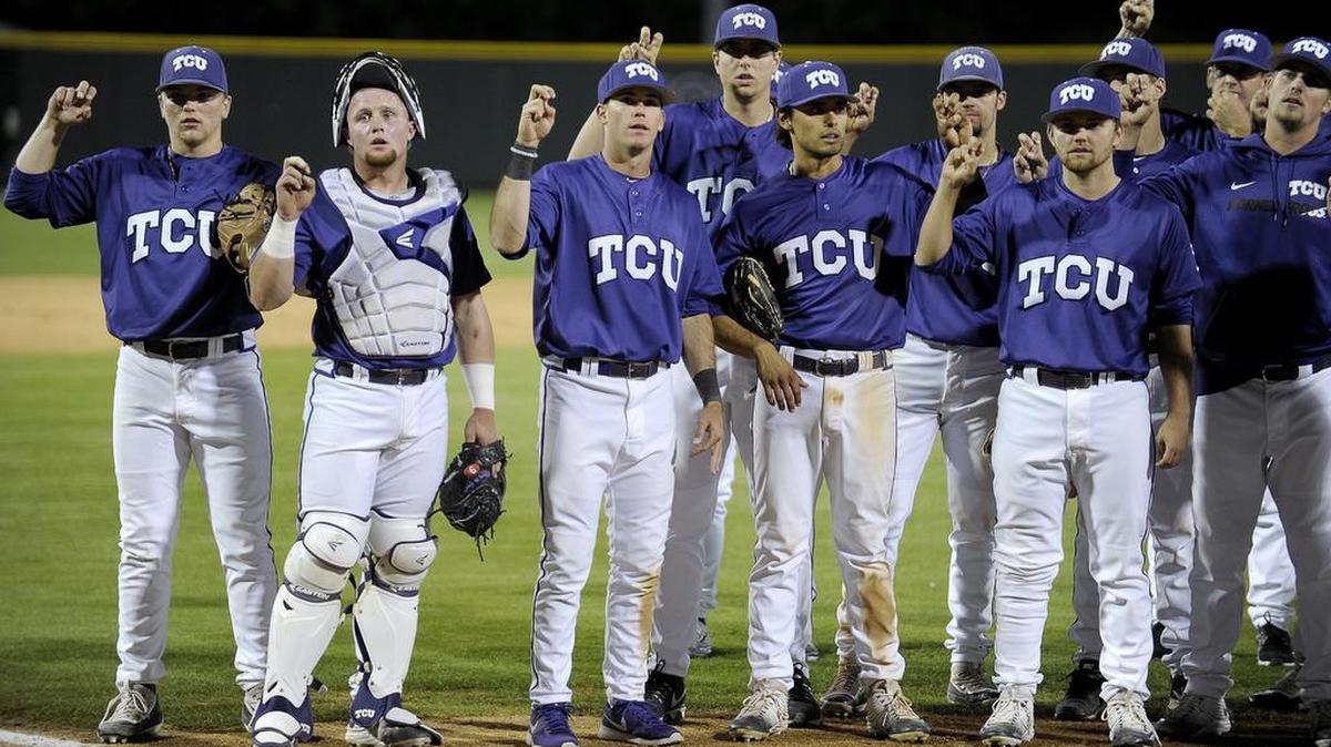 TCU players gather to sing the school song following a March 22, 2016, game against Abilene Christian at Lupton Stadium. The Horned Frogs won 6-4.