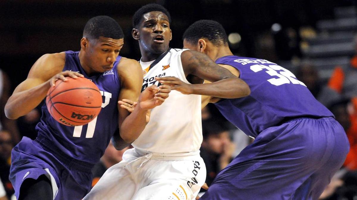 Guard Brandon Parrish and TCU had a hard time protecting the ball against Jawun Evans and Oklahoma State.