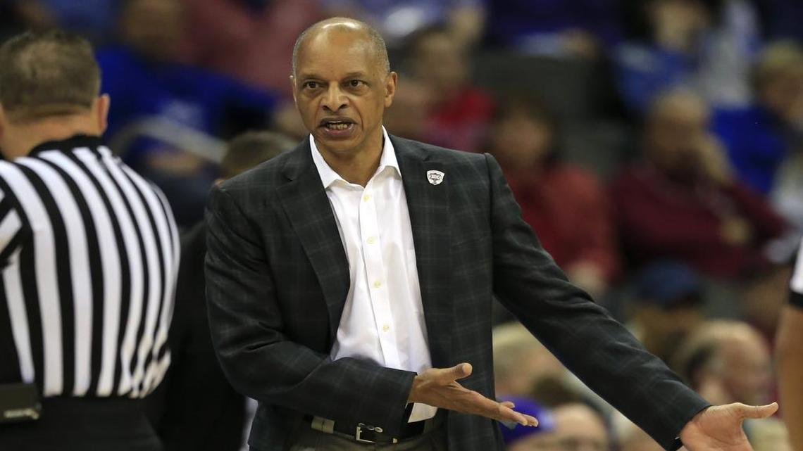 TCU coach Trent Johnson talks to an official about a call in Thursday night’s game against West Virginia at the Big 12 tournament. The Frogs’ season ended in an 86-66 loss. TCU was playing in the quarterfinal game after beating Texas Tech on Wednesday.