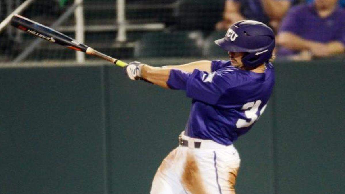 
Garrett Crain clubs a two-run double in the fourth inning to give TCU an 8-2 lead Wednesday.


