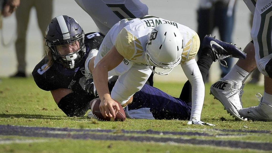TCU defensive end Mat Boesen sacks Baylor quarterback Anu Solomon in the Horned Frogs’ 45-22 win over the Bears on Nov. 24, 2017.