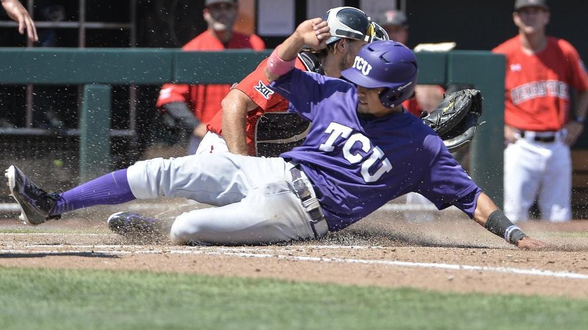 TCU’s Elliott Barzilli slides at home plate to score on a throwing error in the fourth inning of a College World Series game against Texas Tech on Sunday. The Horned Frogs won 5-3 en route to their first 2-0 start in Omaha.