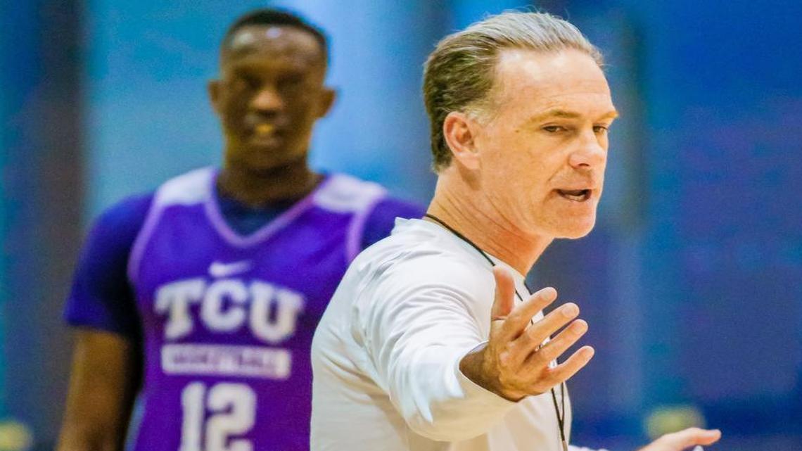 TCU coach Jamie Dixon gestures during a July 19 practice in preparation for the Horned Frogs’ Australia exhibition tour. Redshirt freshman forward Kouat Noi stands in the background.