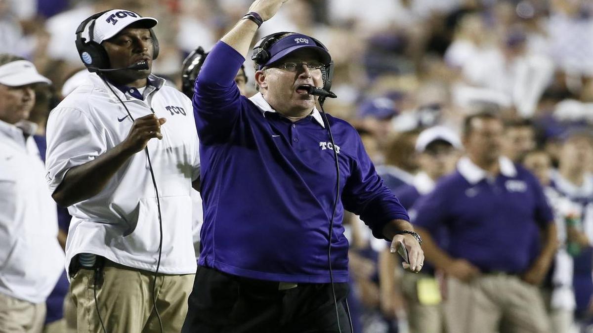 
TCU coach Gary Patterson sends instructions to the defense during last week’s game against SMU. He said this week’s opponent, Texas Tech, is a better football team than a year ago.
