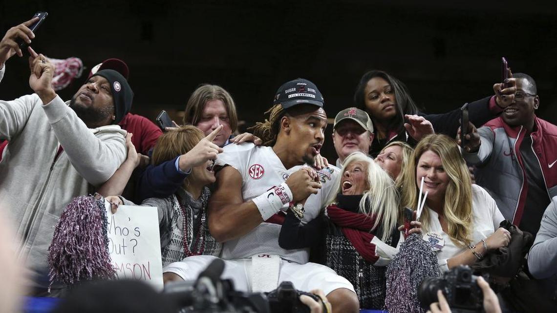 Alabama quarterback Jalen Hurts, who graduated from Channelview High School, celebrates with fans after the Crimson Tide beat Clemson 24-6 in the College Football Playoff semifinals in the Sugar Bowl in New Orleans on Jan. 1.