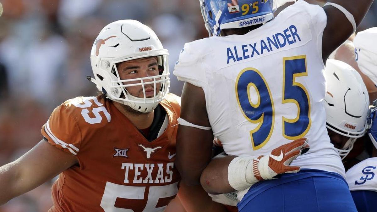 Texas offensive lineman Connor Williams, left, who attended Coppell, blocks during a game against San Jose State in Austin in September. Williams is one of five Texas Longhorns who have declared early for the NFL Draft.